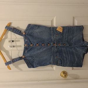NWT. American Rag Jean Overalls w/ Sweetheart cut with rose gold accents.